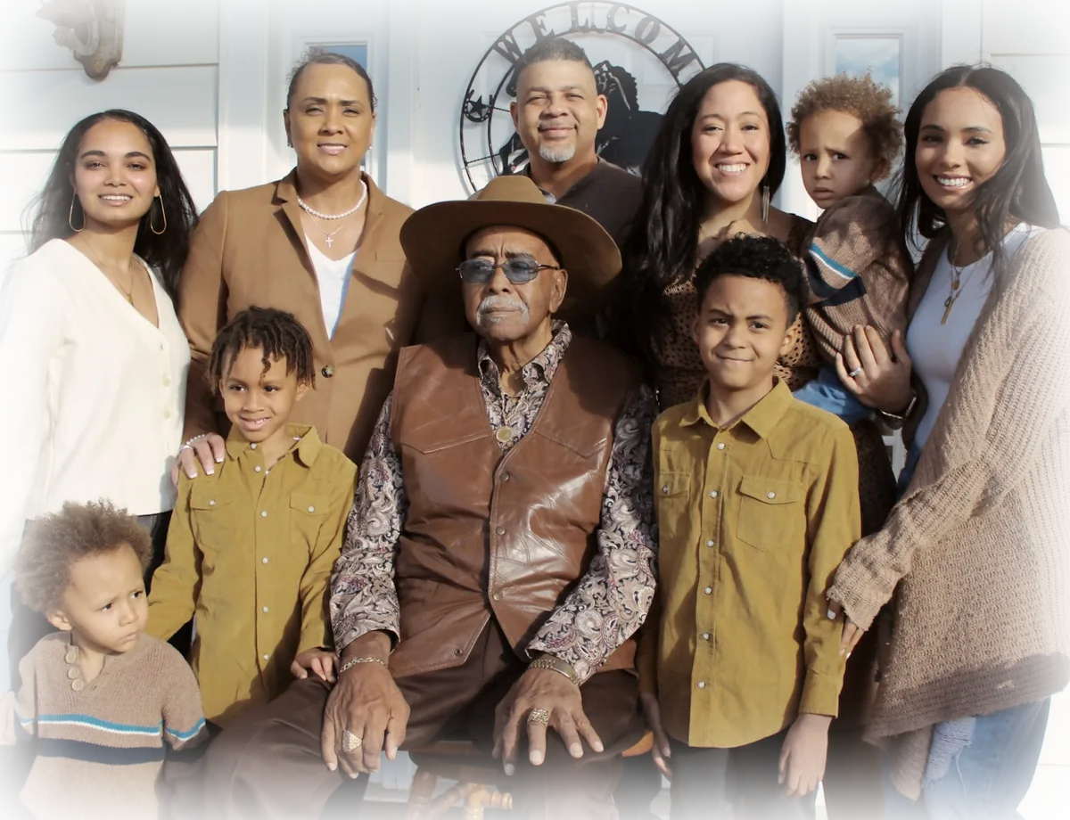 Three generations of a family gathered together for a portrait